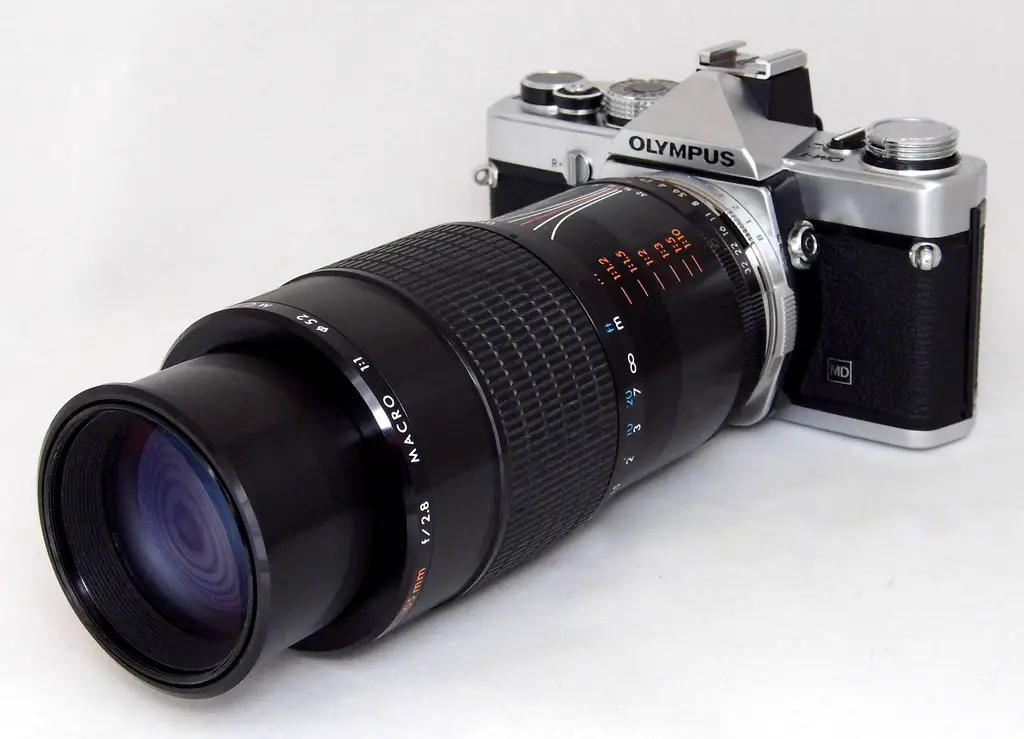 Vintage Olympus OM-1 35mm Film SLR Camera With Kiron 105mm f2.8 Macro Lens, Both Lens And Camera Made In Japan, Circa 1973