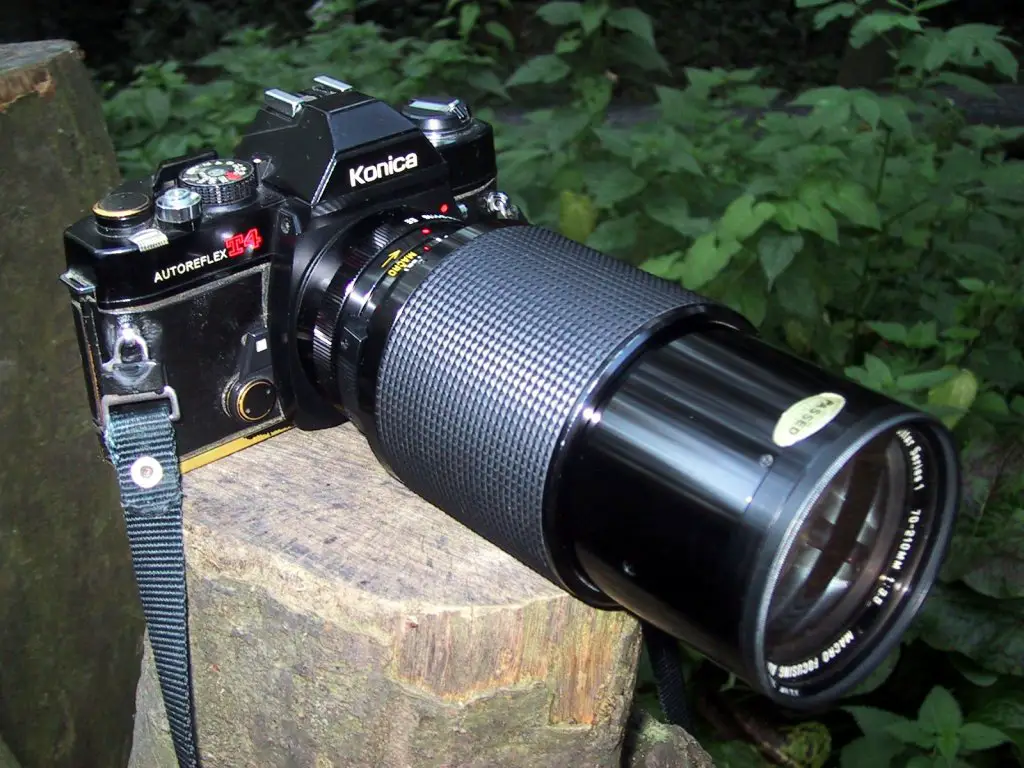 Konica Autoreflex T4 film SLR camera with Vivitar Series 1 70-210mm F3.5 Macro Focusing Auto Zoom lens