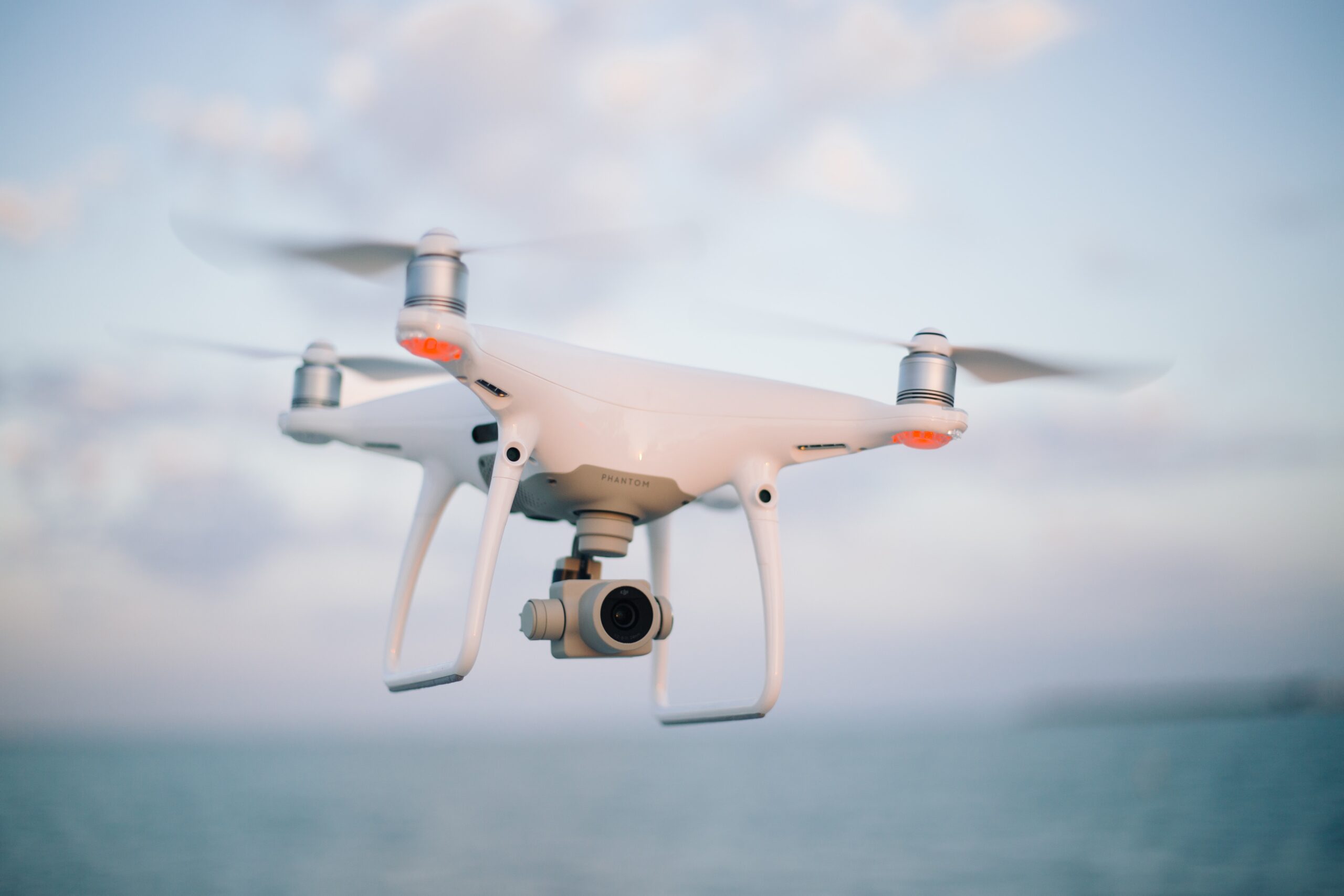 Quadcopter camera drone in flight